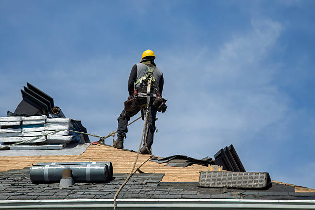Professional Roof Replacement technician working in Greenville, NH